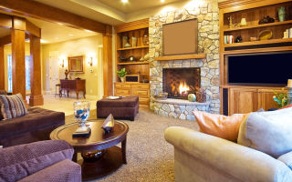 Уютная и теплая гостиная с камином: 4 типа обустройства